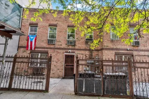 Three-Family Brick and Block Home