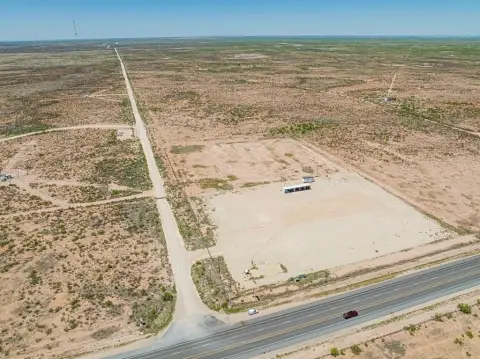 100 Acres Corner Lot on HWY