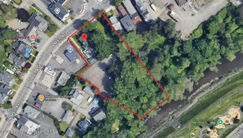 Commercial Development Land with Rental House