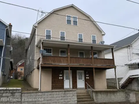 Duplex with Two Apartment Layouts