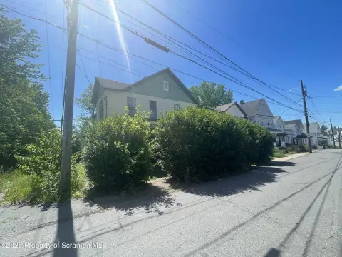Side-by-Side Duplex Fixer-Upper