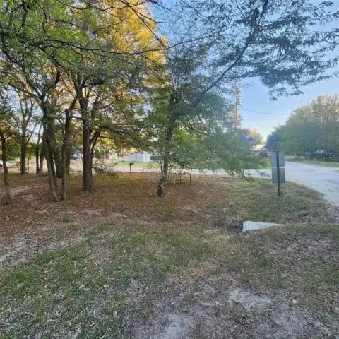 Lakefront Community Wooded Corner Lot
