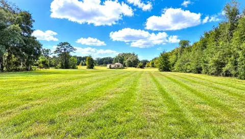 Commercial Land with Existing Improvements