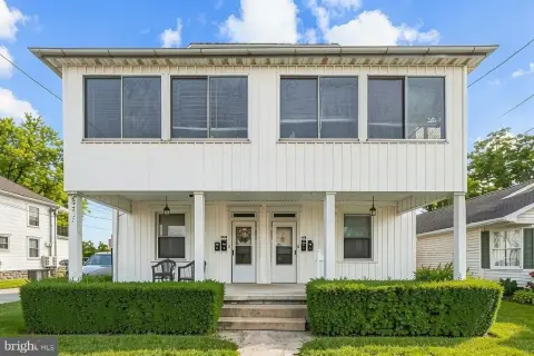 Occupied Quadplex with 8 Garage Bays