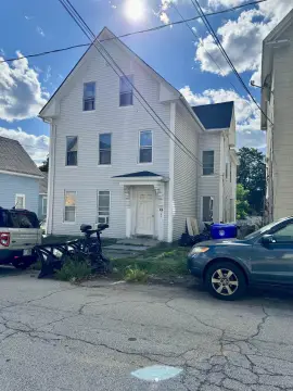 Triplex with Garage and Parking