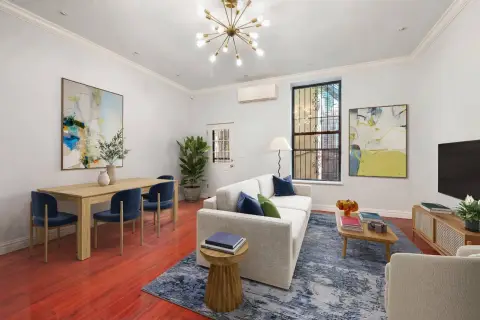 Three-Family Townhouse with Private Garden