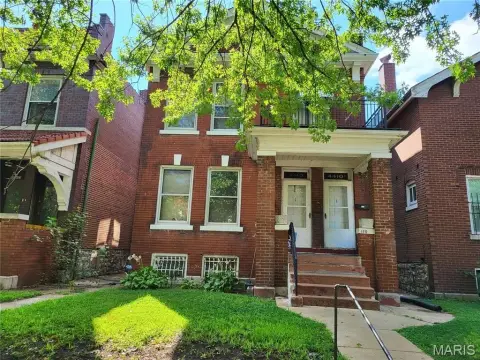 Brick Duplex with Updated Kitchens