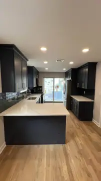 Detached Brick Triplex with Decks