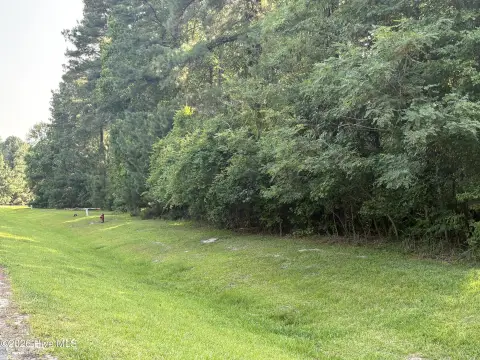 Gated Waterfront Homesite in Community