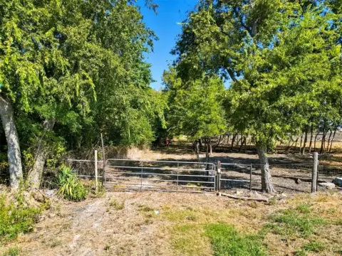 Heavily Wooded Land with Creek