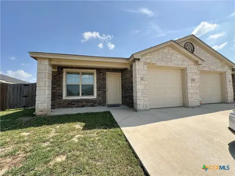 Duplex with 1-Car Garages