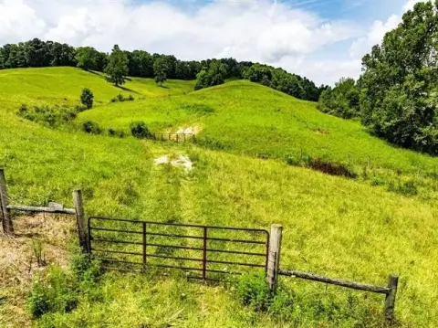 Cleared Agricultural Land with Pond