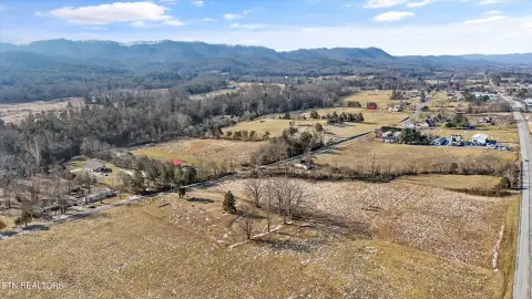 Farmland with Creek and Farmhouse
