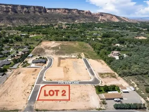 Land with Monument and Bookcliffs Views