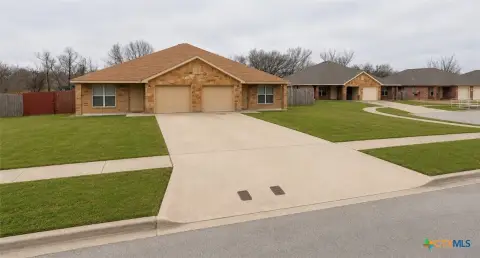 Updated Duplex with Private Backyards