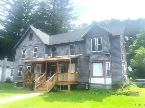 McGraw Village Triplex Investment Opportunity