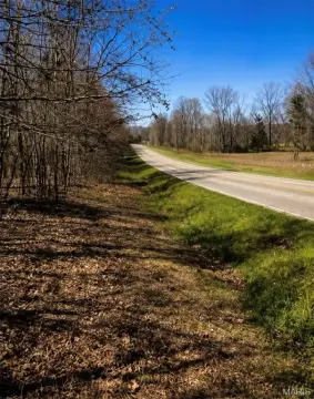 78 Acres Wooded Land with Pond