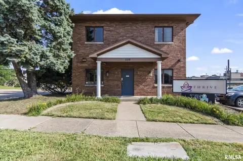 Brick Mixed-Use Building with Parking Lots