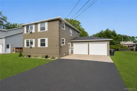 Updated Duplex with Attached Two-Car Garage