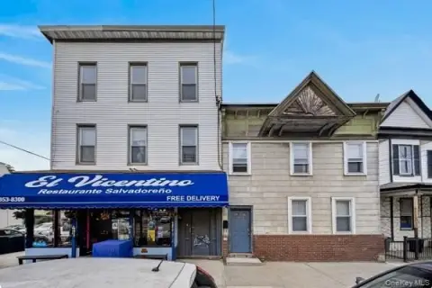 Mixed-Use Building with 4 Garages