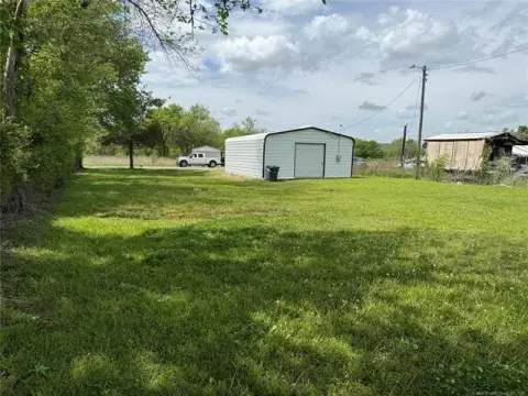 Land Parcel with Shop Building