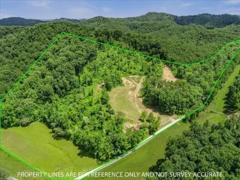 Partially Cleared Farm Tract with Barn
