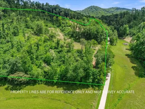 Partially Cleared Farm Tract with Barn