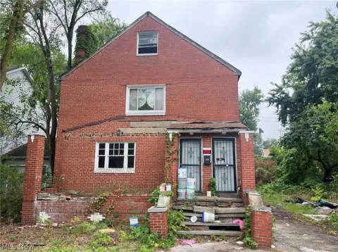 Brick Triplex Requiring Renovation