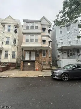 Three-Story Triplex with Garage