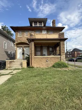 Brick Duplex with Detached Garage