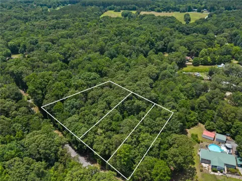 Wooded Waterfront Land Parcel