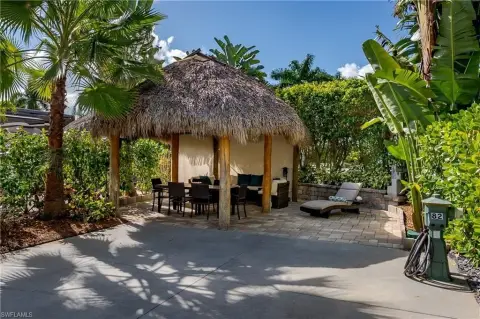 Tropical Oasis with Oversized Tiki
