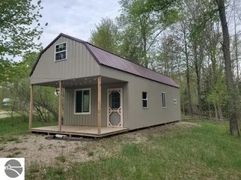 Heavily Wooded Land with Cabin