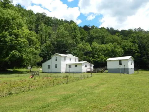 Agricultural Land with Farmhouse