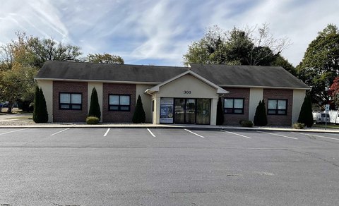 Renovated Office Building With Two Suites