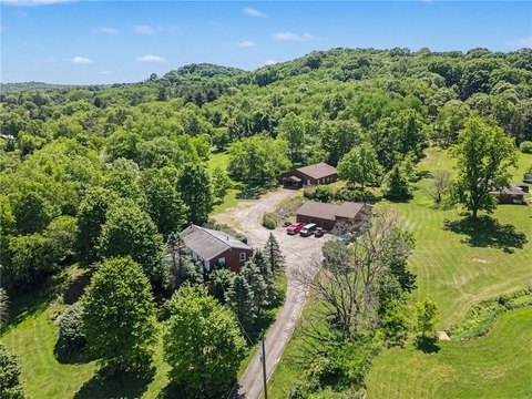 Acreage with Heated Workshop Garage