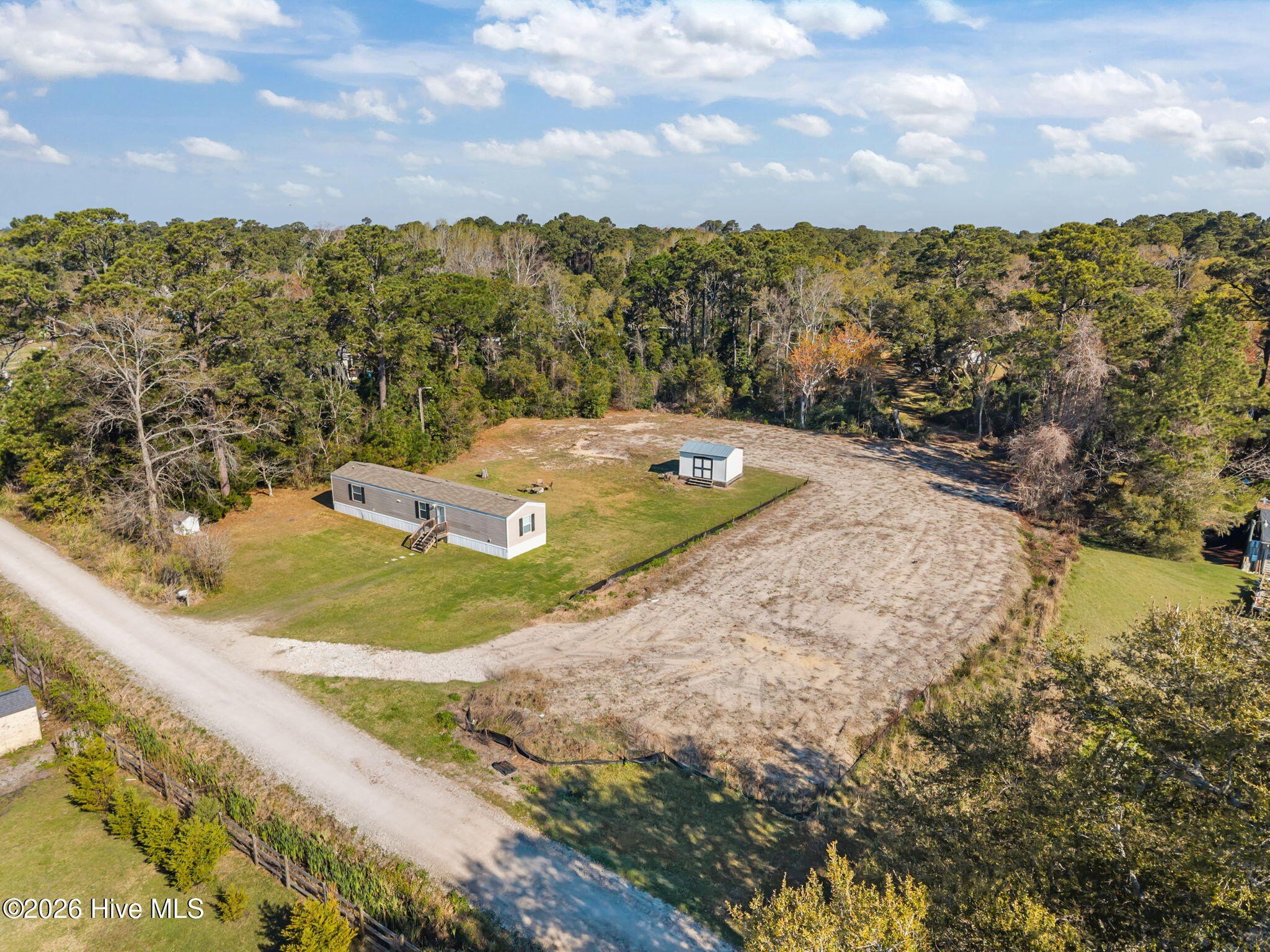 Cleared Land with Modern Home