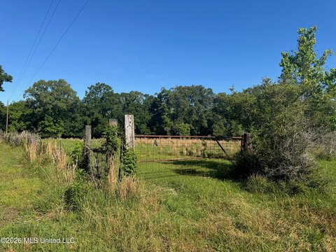 Fenced Farmland with Steel Barn