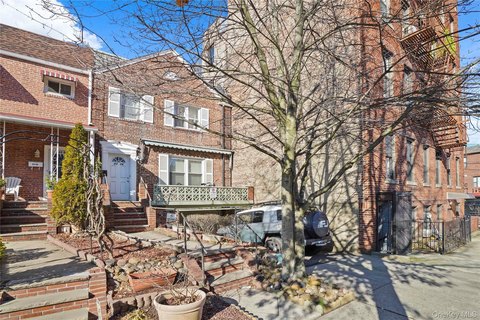 Woodside Two-Family Home with Driveway