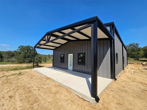 Heavily Treed Land with New Barn