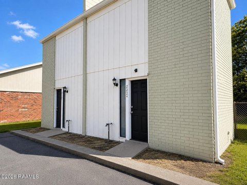 Duplex With Fenced Backyards