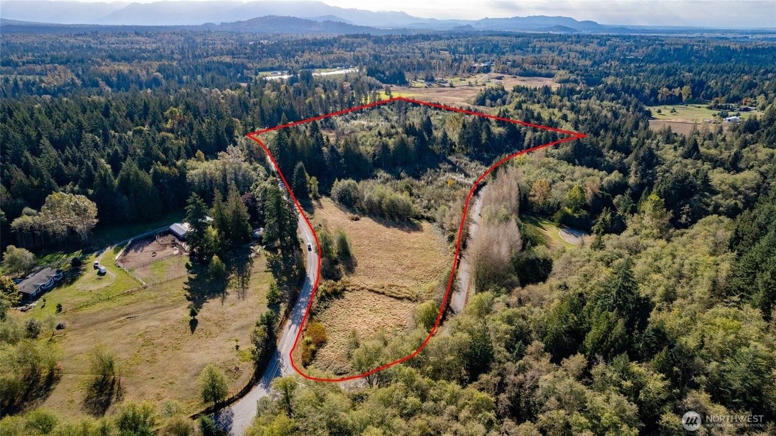 Expansive Vacant Land with Pond
