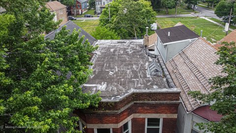 Brick Duplex with Enclosed Porch