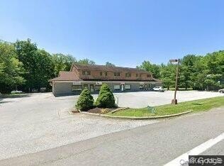 Mixed-Use Plaza with Farmhouse
