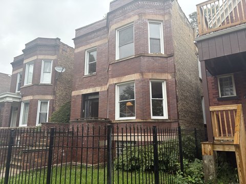 Brick Duplex Requiring Renovation