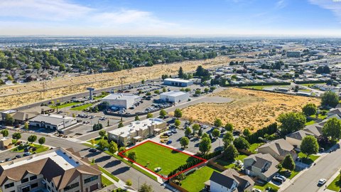 Developed Commercial Land with Parking Lot
