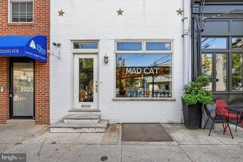 Two-Story Storefront with Office Nooks