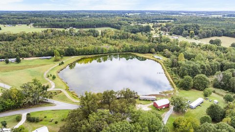 Unrestricted Acreage with Multiple Residences