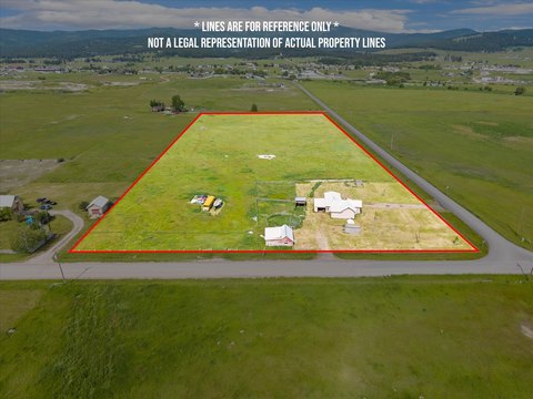 Fenced Acreage with Ranch Potential