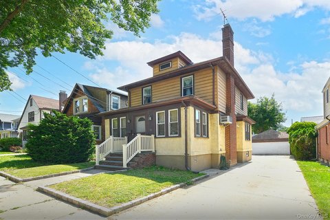 Two-Family Duplex with Detached Garage